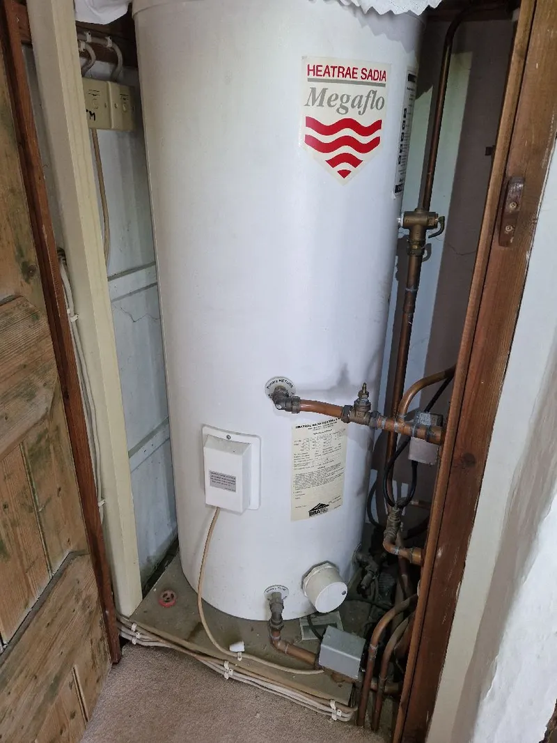 Megaflo hot water cylinder with copper pipework